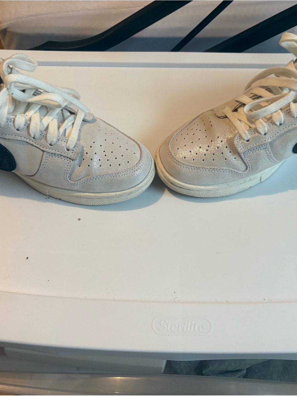Nike Women's White Suede Sneakers with Black Swoosh